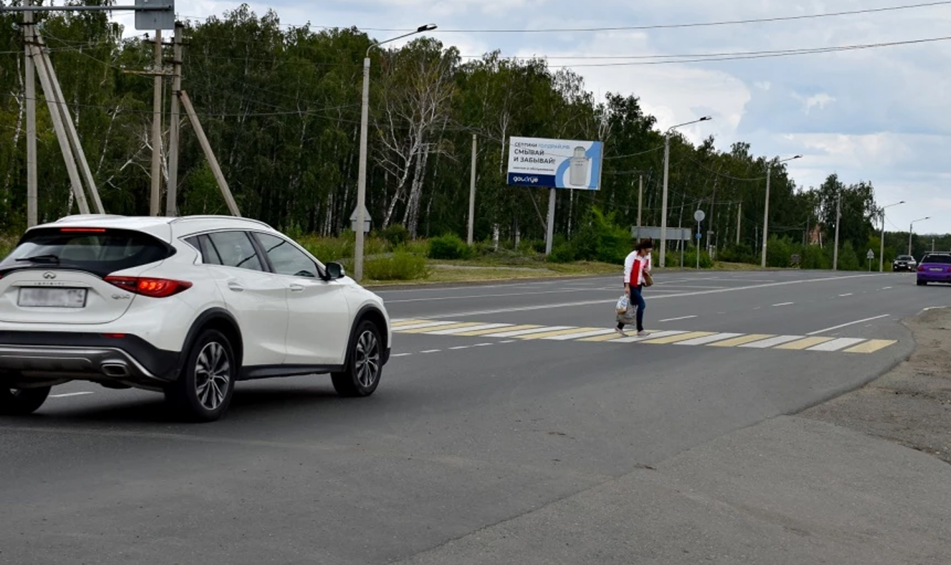 Автомобилисты считают опасным забор на трассе, ведущей к садам
