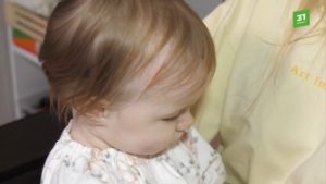 ребенок с отитом